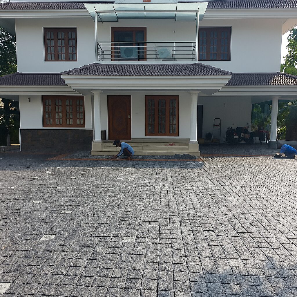 two_storey_house_with_granite_paved_driveway